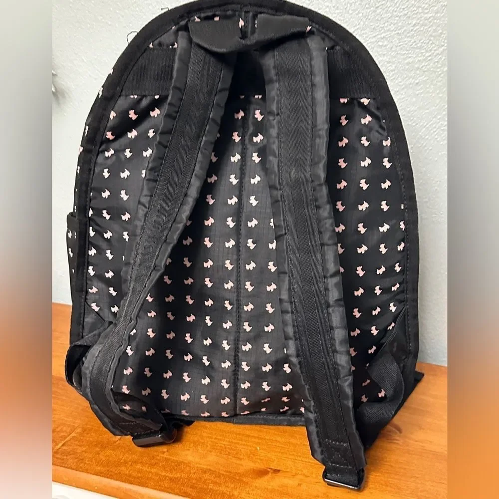Agatha Paris Black Backpack With Pink Scottie Dog Pattern all over.